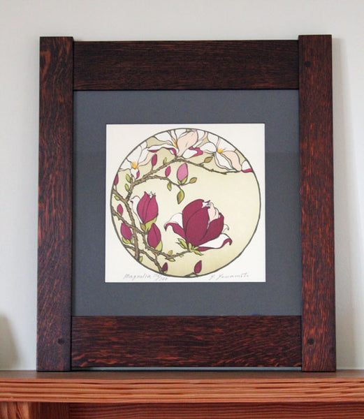 <p>Stunning signed  limited edition oak framed block print of a magnolia tree in an Arts and Crafts era inspired design. As though looking through a Chinese moon gate  this decorative circle block print takes us into the natural world around us.</p>