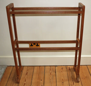 <p>Rare antique Arts & Crafts Heals oak towel rail.</p>