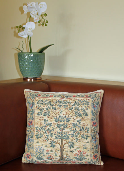 <p>Fine quality cotton jacquard loom woven tapestry cushion with beige velvet back in a design inspired by William Morris's 'Tree of Life' tapestry. Has a concealed zip-fastener and removable feather pad. Weave design on the border has an 'aged' effect.</p>