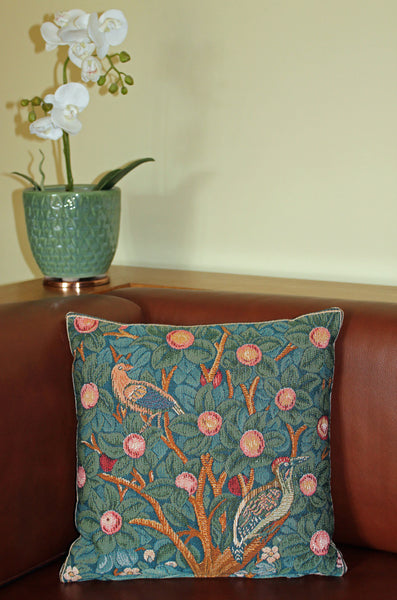 <p>Fine quality cotton jacquard loom woven tapestry cushion with beige velvet back in William Morris's Woodpecker design. Has a concealed zip-fastener and removable feather pad. </p>