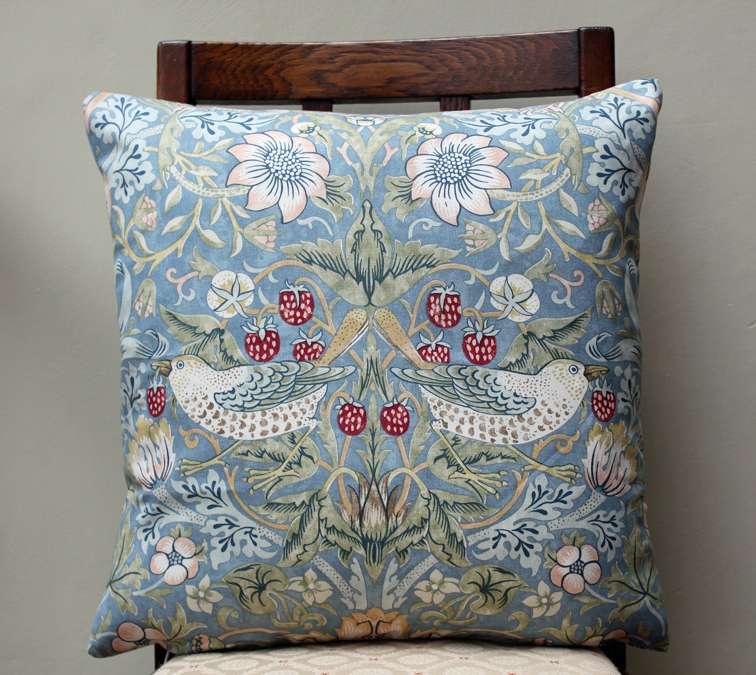 <p>Cotton cushion in William Morris Strawberry Thief slate print. Sanderson fabric.</p>